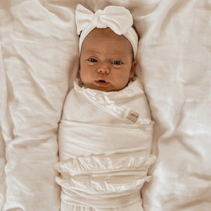 Ziggy Lou Bamboo Stretch Swaddle in Cream | 25% OFF | Children of the Wild